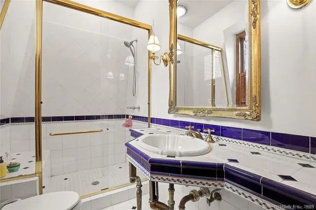 a bathroom with a bathtub and a sink