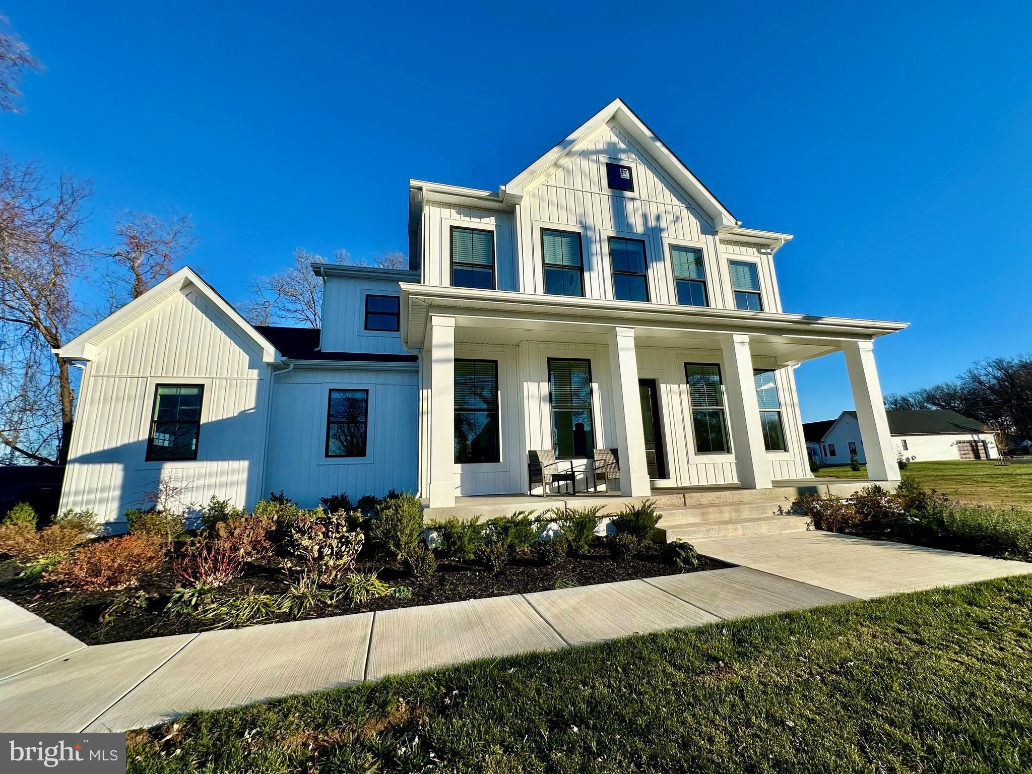 5725 Hodges Road Sykesville, MD 21784 - Photo 1 of 56 a front view of a house with a yard