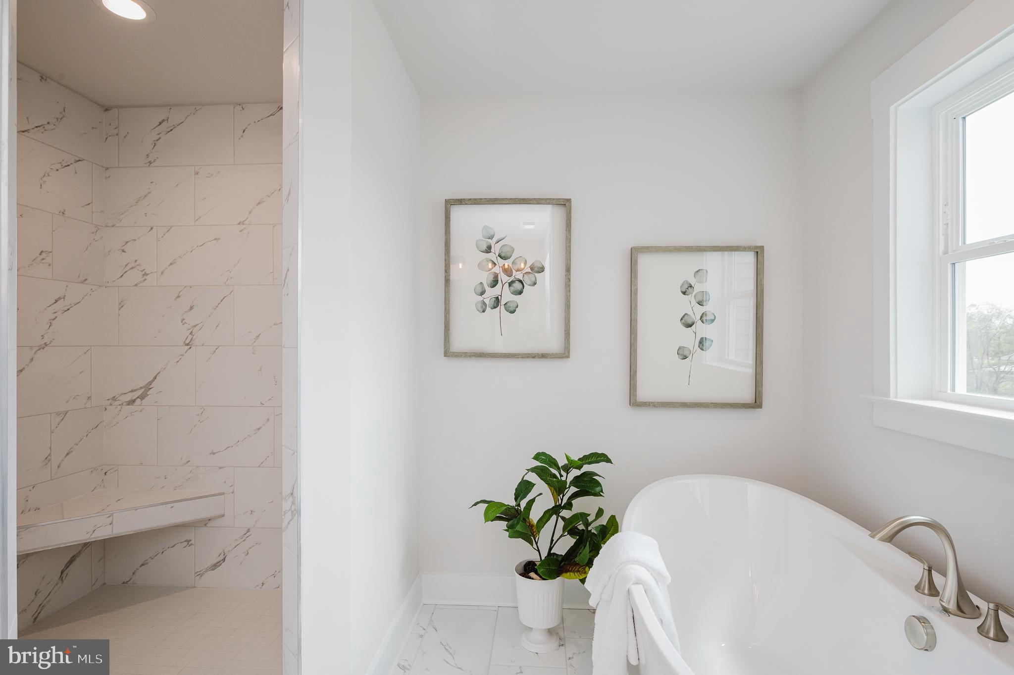 5725 Hodges Road Sykesville, MD 21784 - Photo 12 of 56 a white bath tub sitting next to a white sink