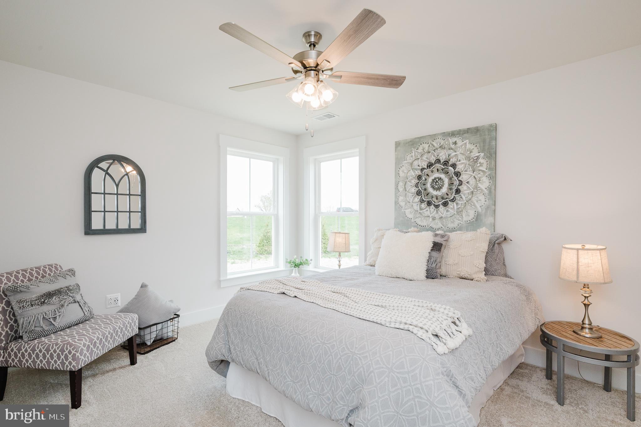 5725 Hodges Road Sykesville, MD 21784 - Photo 13 of 56 a bedroom with a bed and window