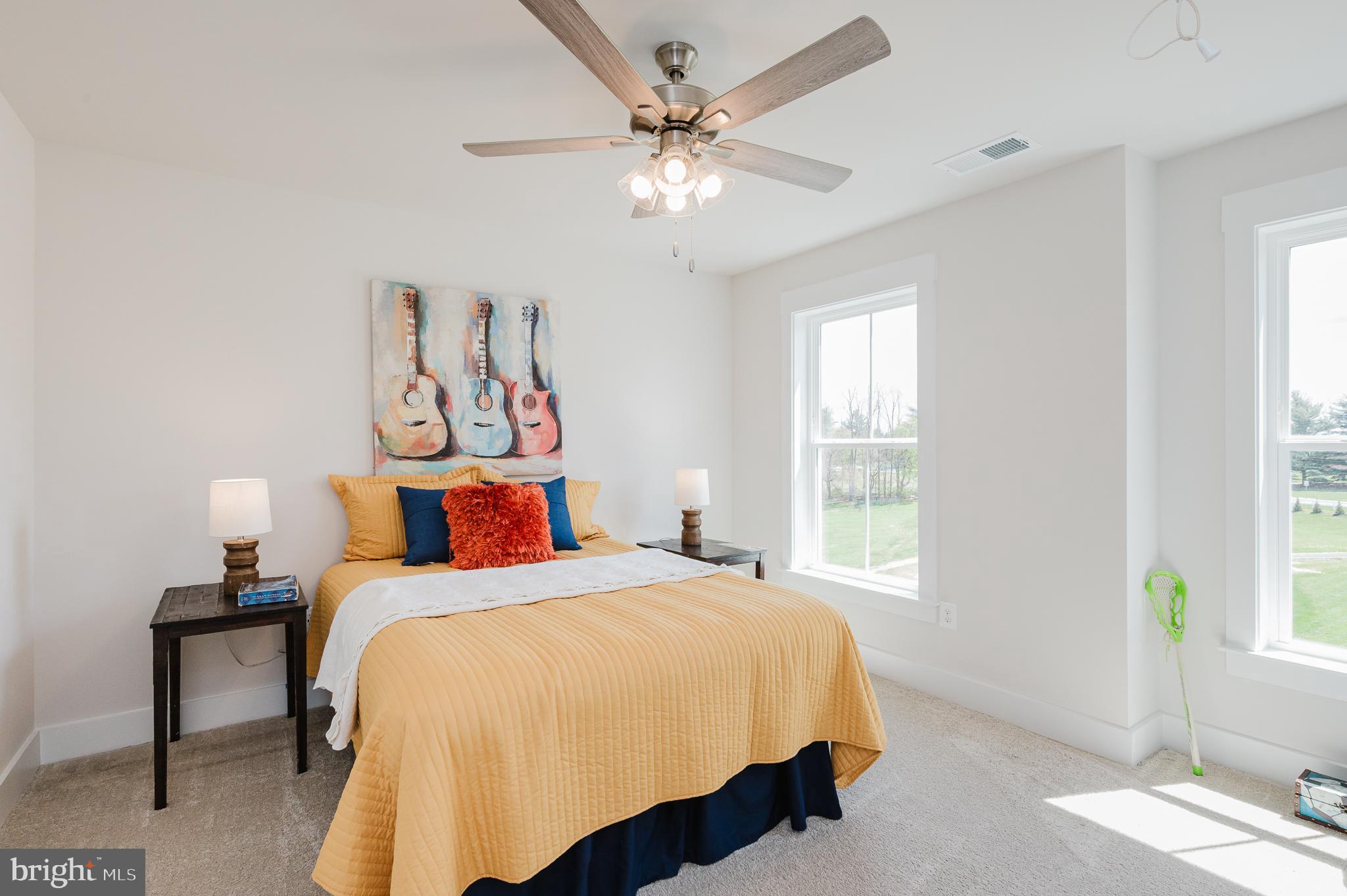 5725 Hodges Road Sykesville, MD 21784 - Photo 16 of 56 a bedroom with a bed and a window