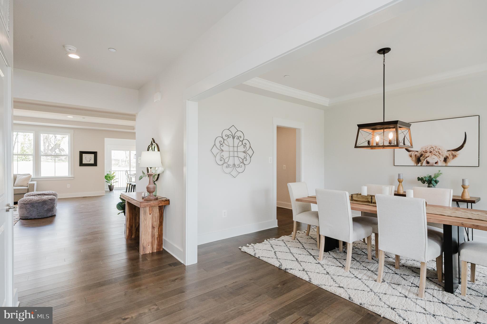 5725 Hodges Road Sykesville, MD 21784 - Photo 19 of 56 a workspace with furniture wooden floor and windows