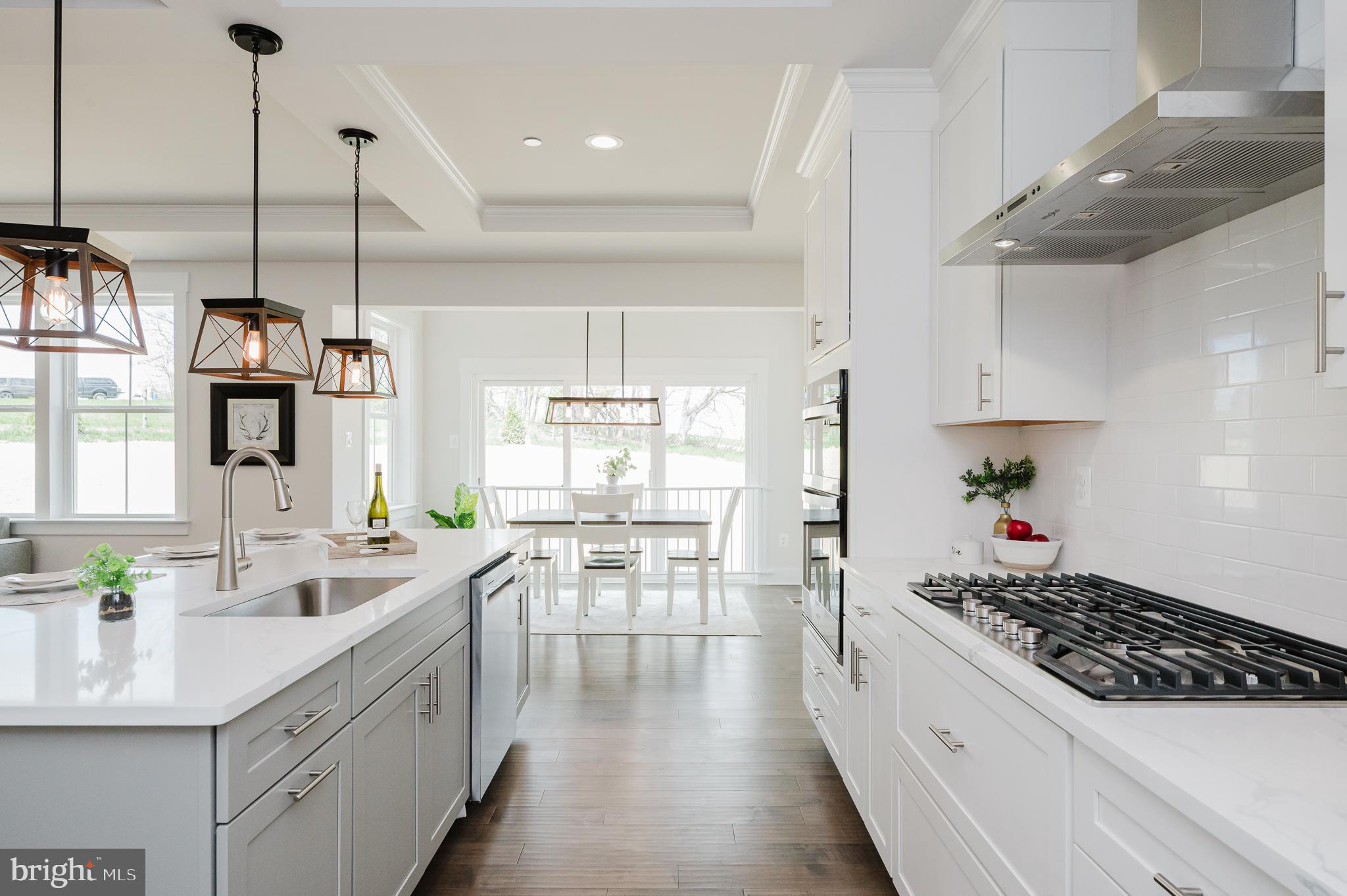 5725 Hodges Road Sykesville, MD 21784 - Photo 27 of 56 a kitchen with counter top space appliances and cabinets