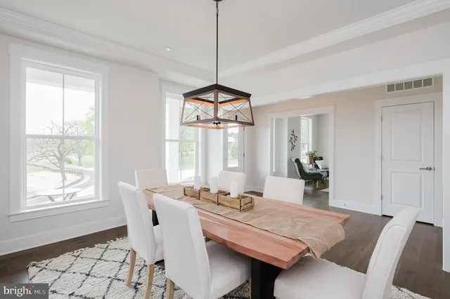 a kitchen with counter top space appliances and cabinets