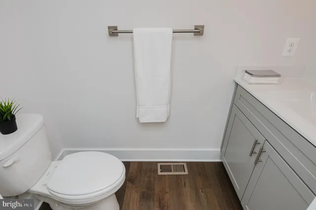 a bed room with a bed and a chandelier