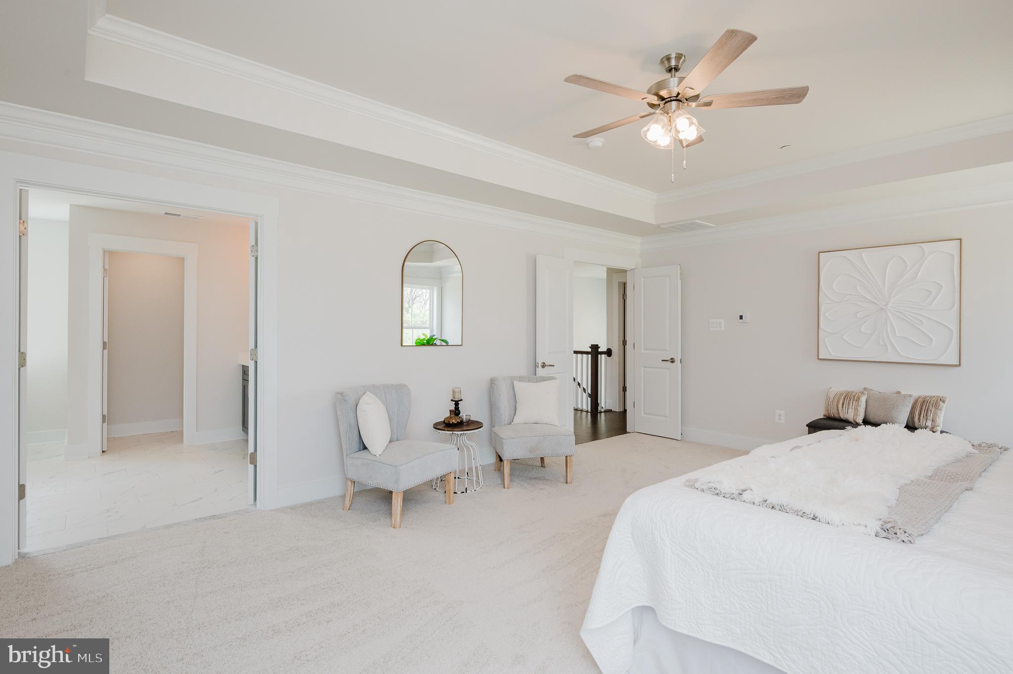 5725 Hodges Road Sykesville, MD 21784 - Photo 41 of 56 a bed room with a bed and a chandelier