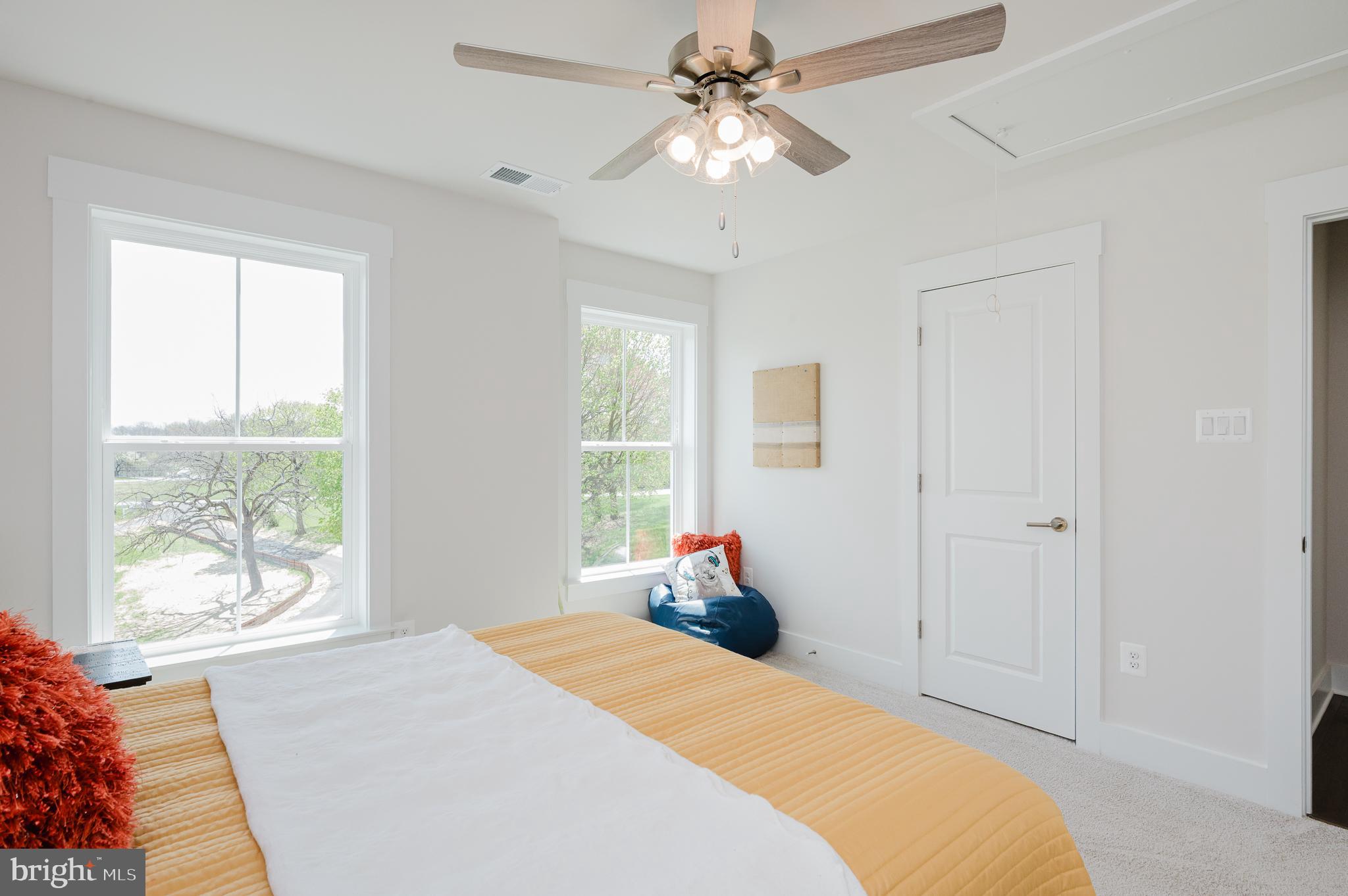 5725 Hodges Road Sykesville, MD 21784 - Photo 54 of 56 a bedroom with a bed dresser and a window