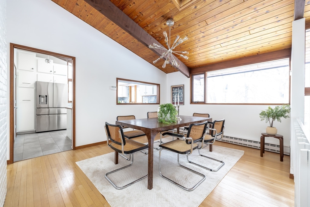 134 Rangeley Road Brookline, MA 02467 - Photo 8 of 27 a view of a dining room with furniture and wooden floor