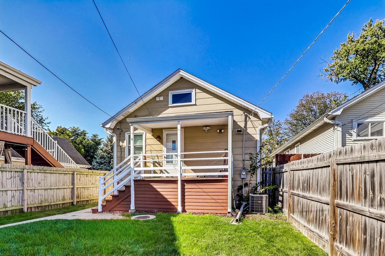 1434 Elgin Avenue Forest Park, IL 60130 - Photo 27 of 35 a front view of a house with a yard