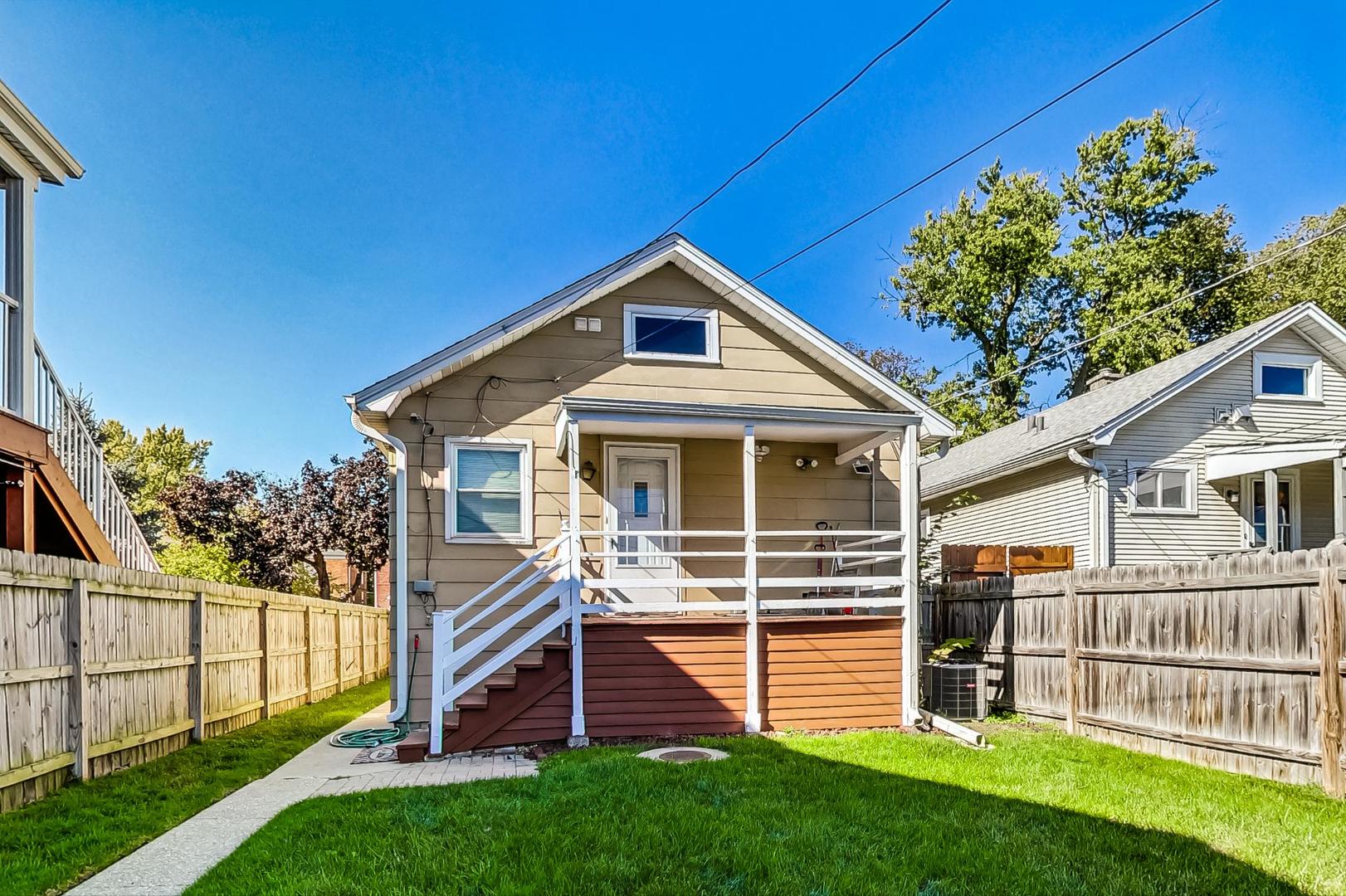 1434 Elgin Avenue Forest Park, IL 60130 - Photo 28 of 35 a front view of a house with a yard