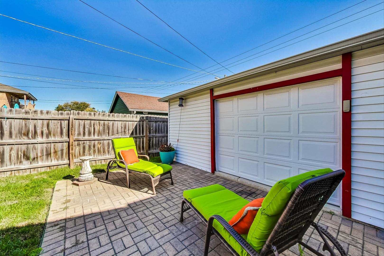 1434 Elgin Avenue Forest Park, IL 60130 - Photo 29 of 35 a view of a backyard with chairs