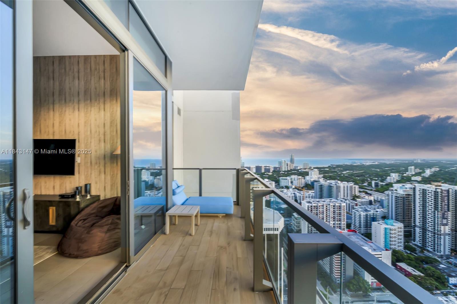 88 Southwest 7th Street, Unit 4006 Miami, FL 33130 - Photo 3 of 22 a view of balcony with furniture