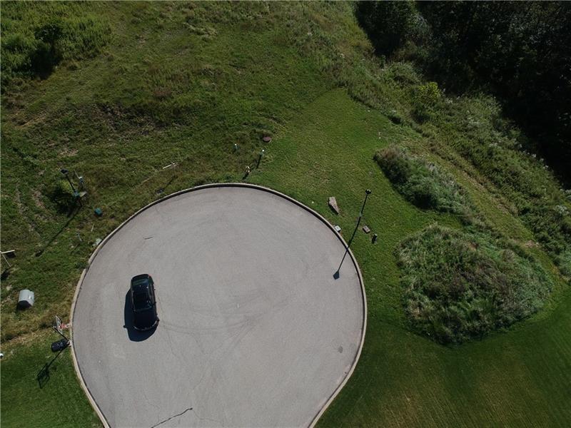 a view of a swimming pool from a balcony