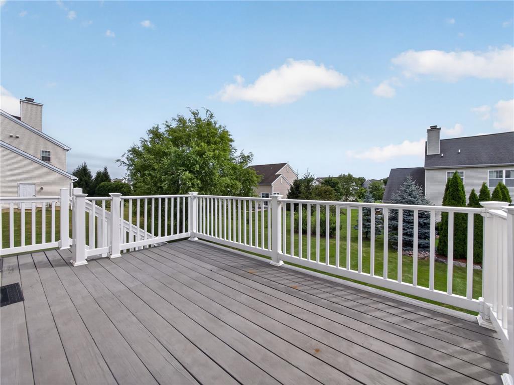 2765 Farmstead Road Easton, PA 18040 - Photo 29 of 50 Step out onto a spacious, sun-drenched deck offering serene backyard vistas and a private outdoor retreat.