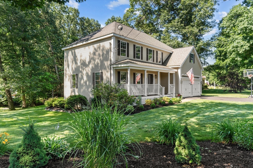 69 Curzon Mill Road Newburyport, MA 01950 - Photo 1 of 40 a front view of house with yard and green space