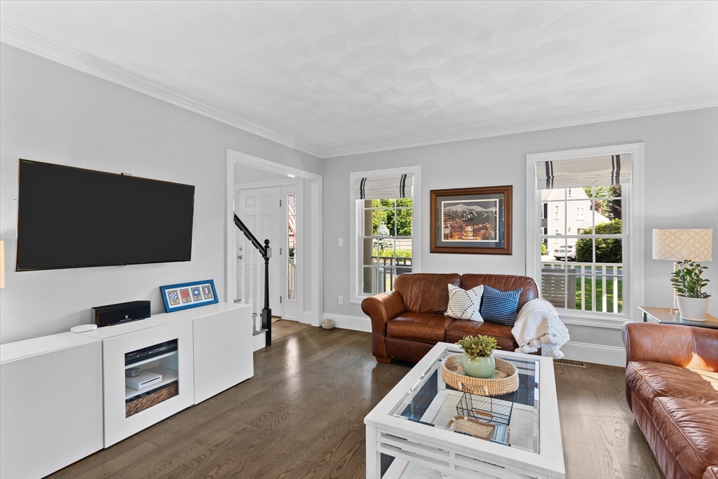 69 Curzon Mill Road Newburyport, MA 01950 - Photo 18 of 40 a living room with furniture and a flat screen tv