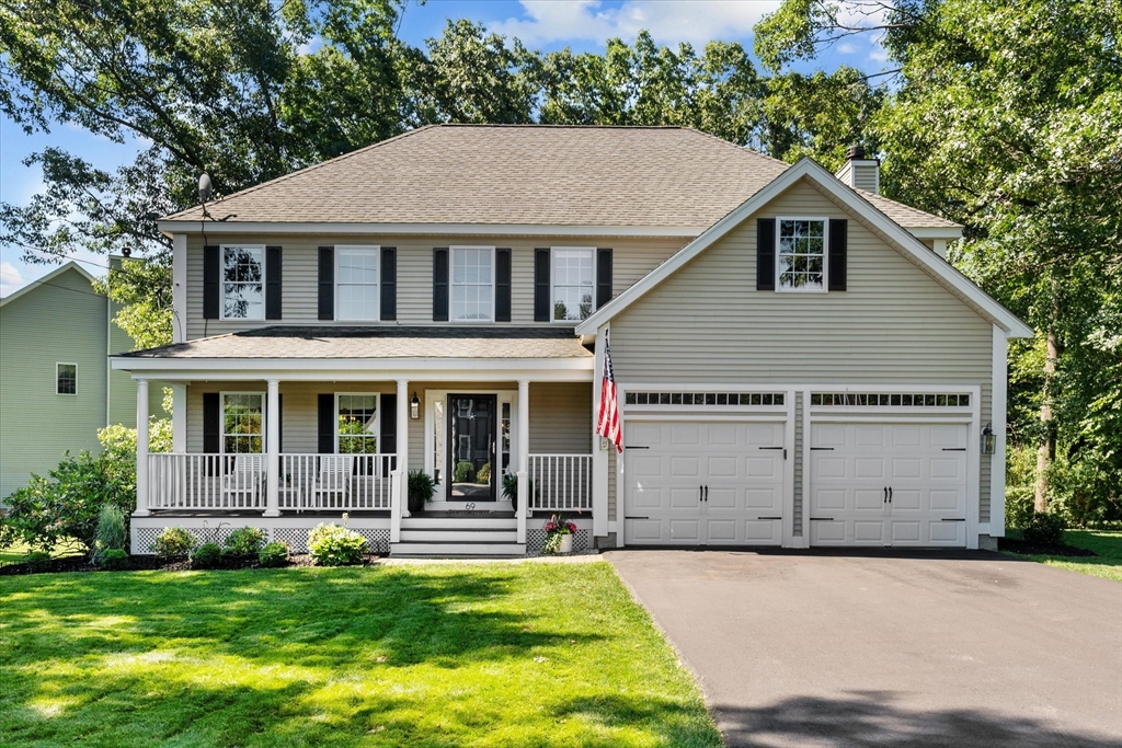 69 Curzon Mill Road Newburyport, MA 01950 - Photo 2 of 40 a aerial view of a house with a yard garage and outdoor seating