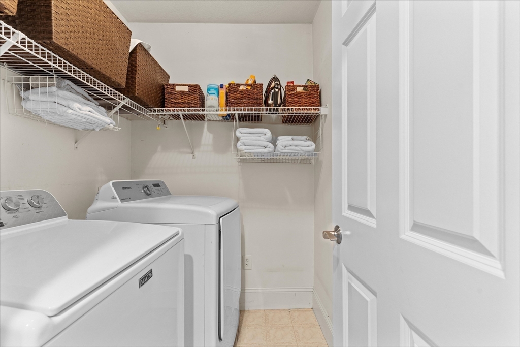 69 Curzon Mill Road Newburyport, MA 01950 - Photo 26 of 40 a utility room with dryer and washer