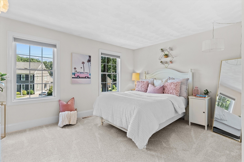 69 Curzon Mill Road Newburyport, MA 01950 - Photo 28 of 40 a bedroom with a bed and a window