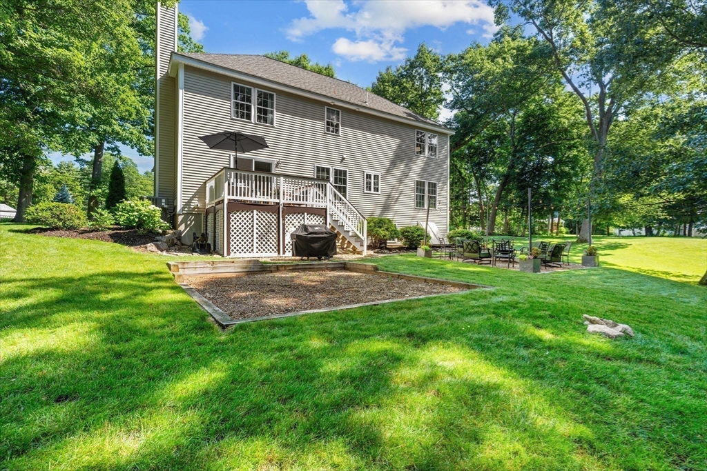 69 Curzon Mill Road Newburyport, MA 01950 - Photo 37 of 40 a view of back yard of the house