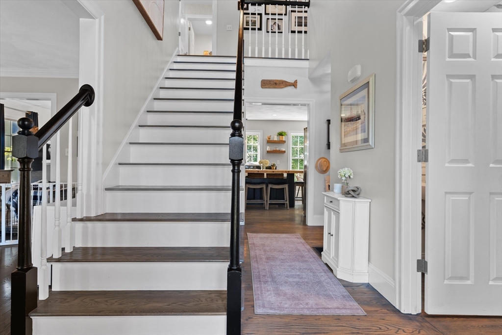69 Curzon Mill Road Newburyport, MA 01950 - Photo 5 of 40 a view of entryway and hall with wooden floor