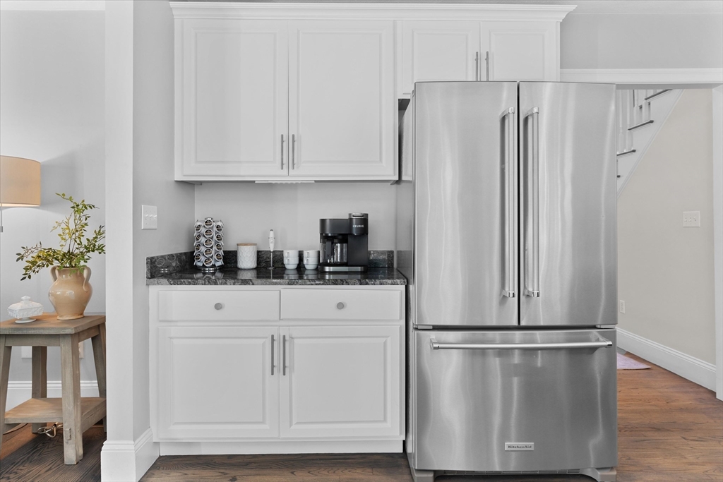69 Curzon Mill Road Newburyport, MA 01950 - Photo 10 of 40 a kitchen with appliances and cabinets