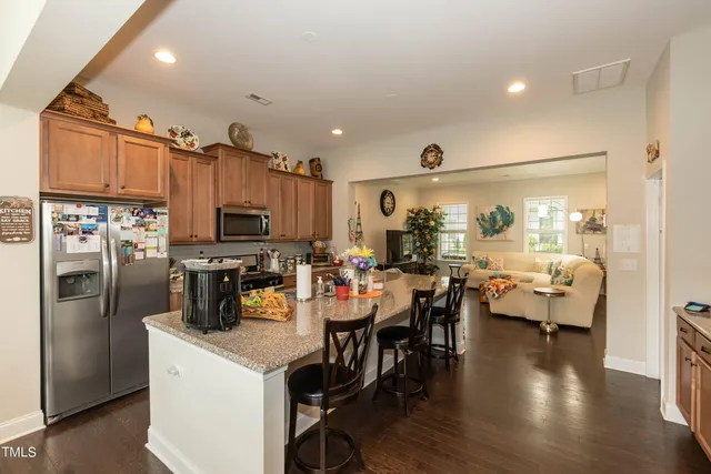 a view of storage and utility room with a window and a couch