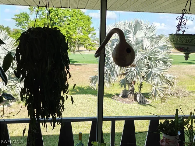 a bedroom with a bed and a dresser in it