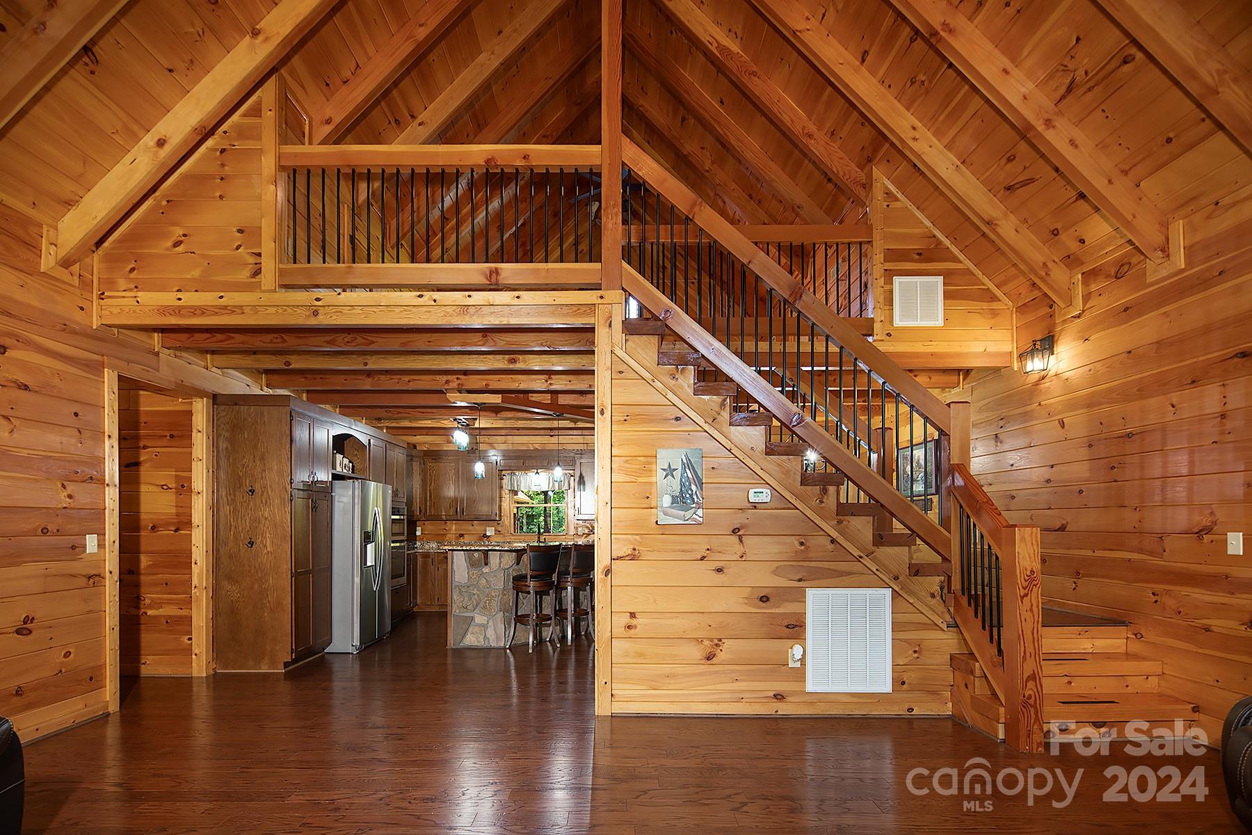303 Lakeview Road Mocksville, NC 27028 - Photo 16 of 47 a view of entryway and hall with wooden floor