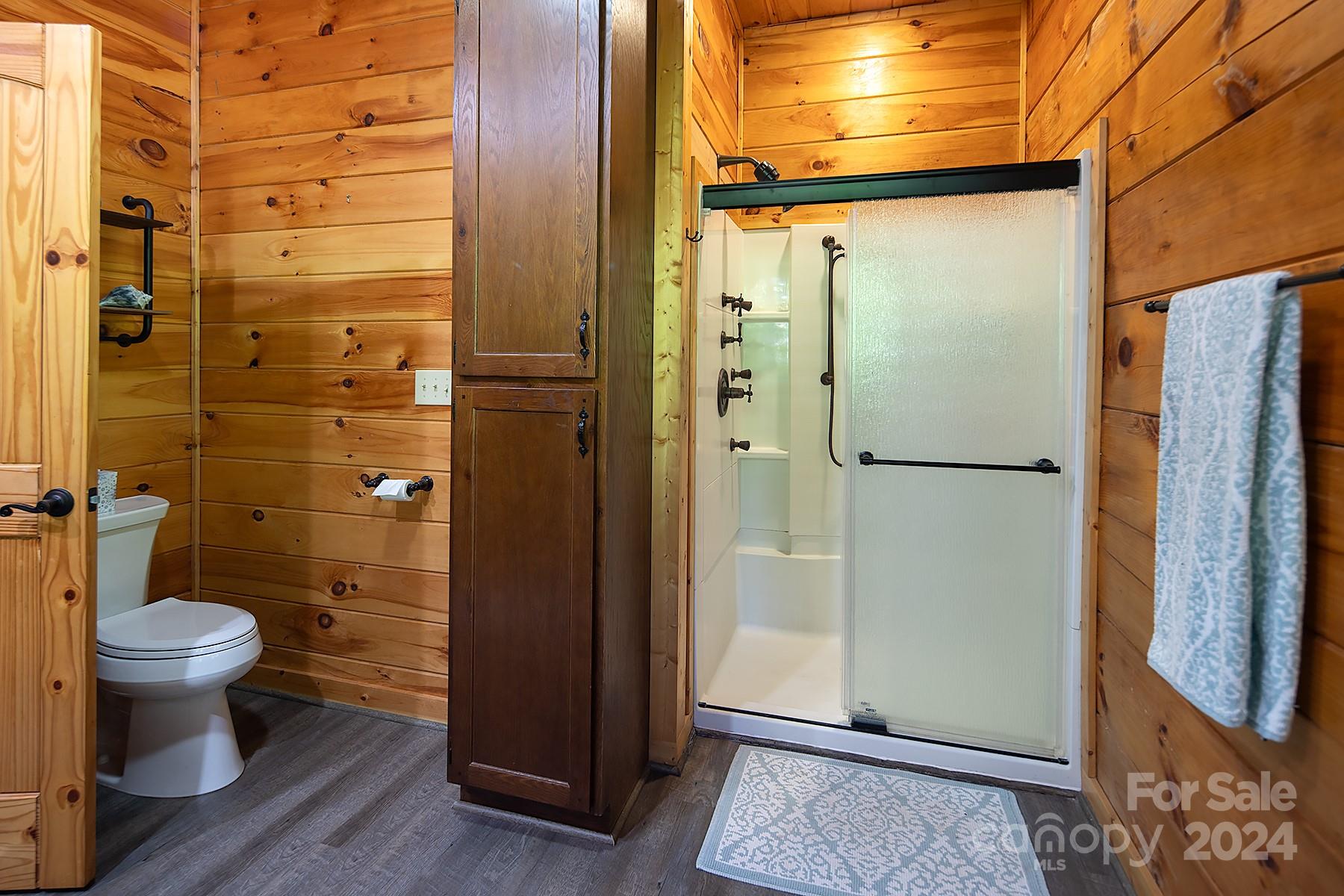 303 Lakeview Road Mocksville, NC 27028 - Photo 24 of 47 a bathroom with a toilet and a shower