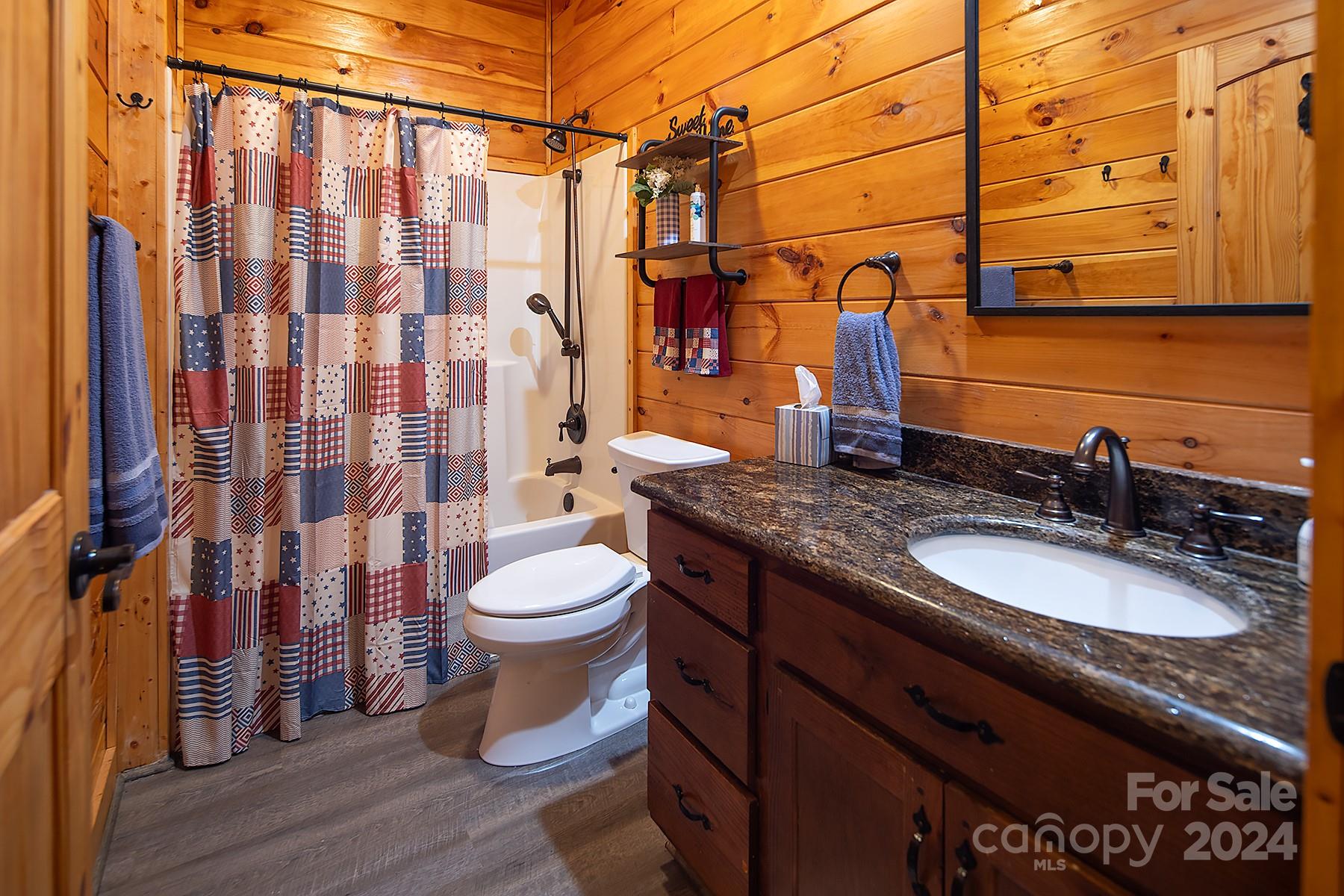 303 Lakeview Road Mocksville, NC 27028 - Photo 28 of 47 a bathroom with a granite countertop sink toilet and shower