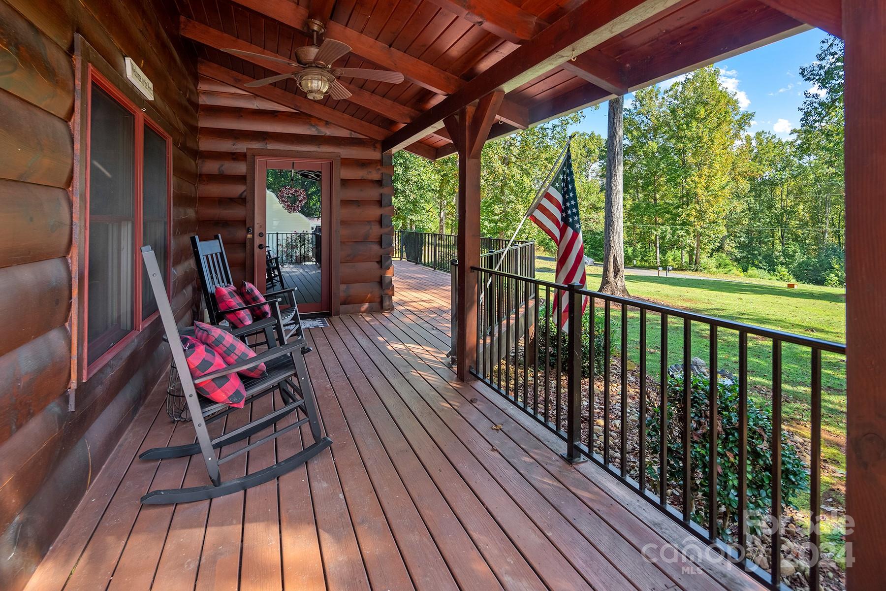 303 Lakeview Road Mocksville, NC 27028 - Photo 3 of 47 a view of a chairs and table in the balcony