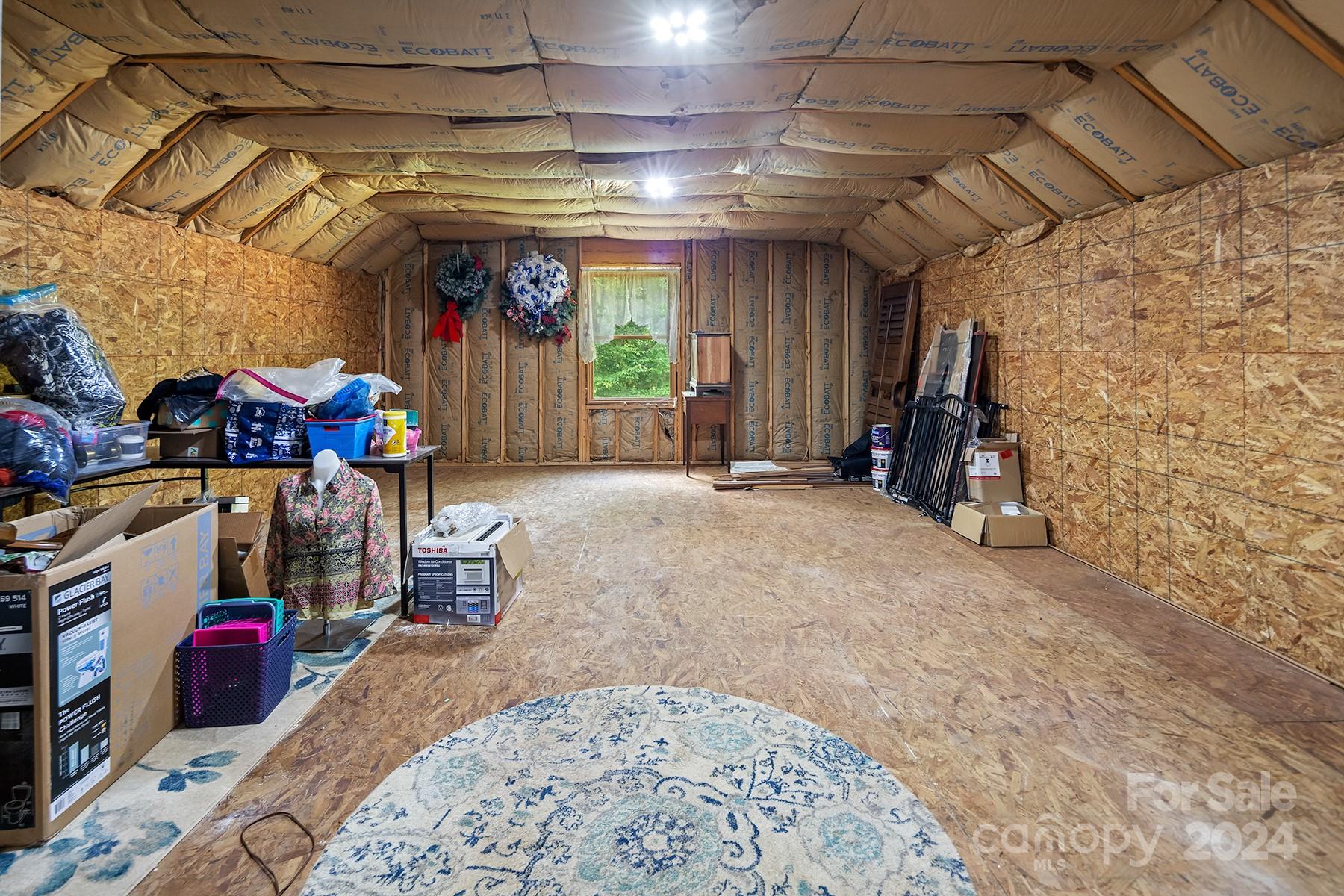 303 Lakeview Road Mocksville, NC 27028 - Photo 36 of 47 a view of a storage room with a lot of stuff