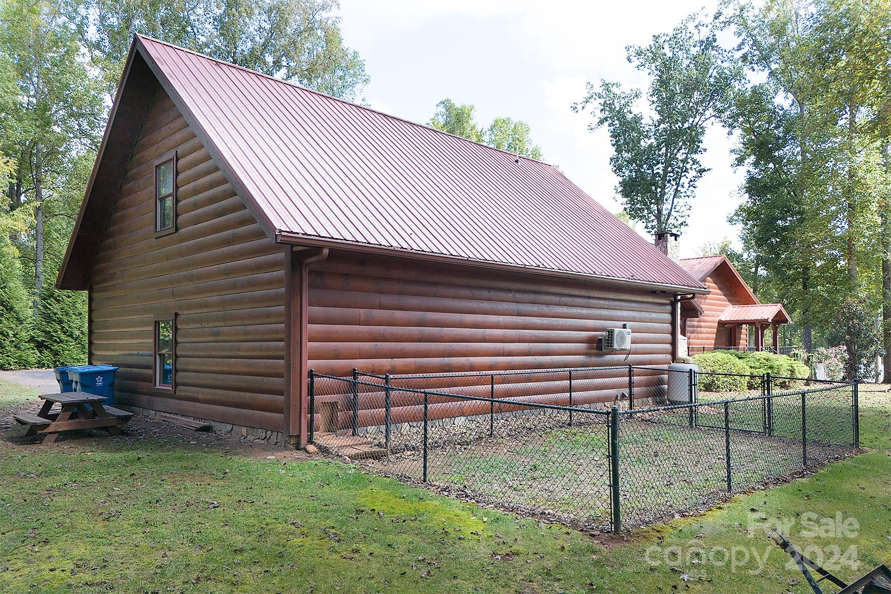 303 Lakeview Road Mocksville, NC 27028 - Photo 40 of 47 a front view of a house with a garden