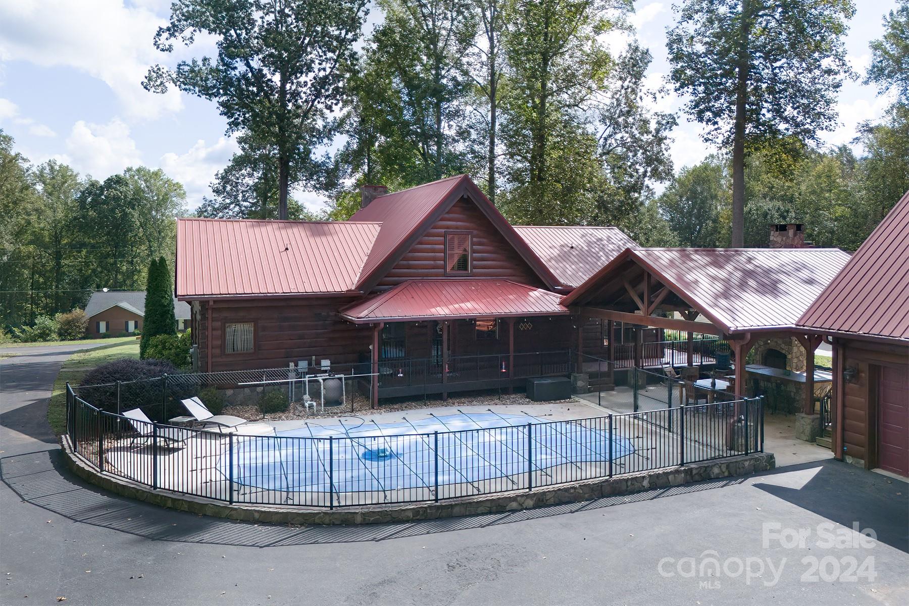 303 Lakeview Road Mocksville, NC 27028 - Photo 4 of 47 a front view of a house with a garden