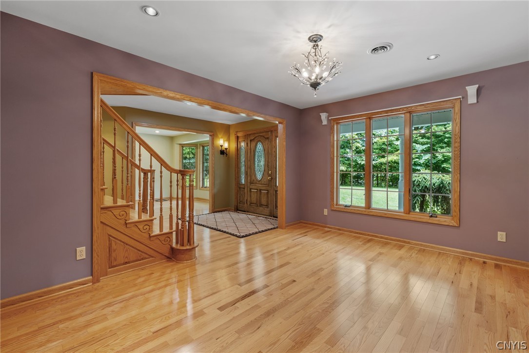 1103 Rail Fence Road Camillus, NY 13031 - Photo 14 of 50 Formal Dining Room with much lighting and natural lights