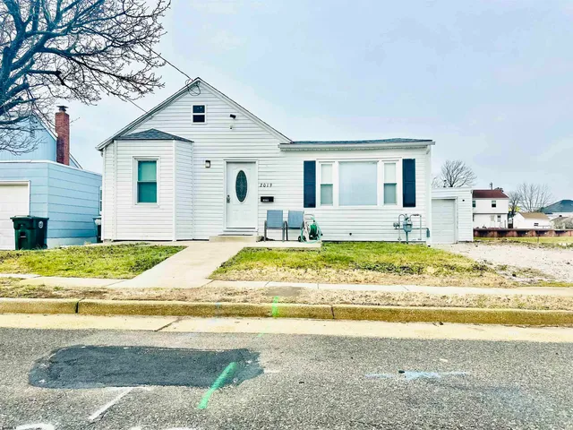 a view of a house with a swimming pool