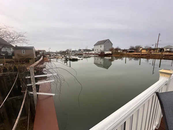 a view of a lake from a balcony