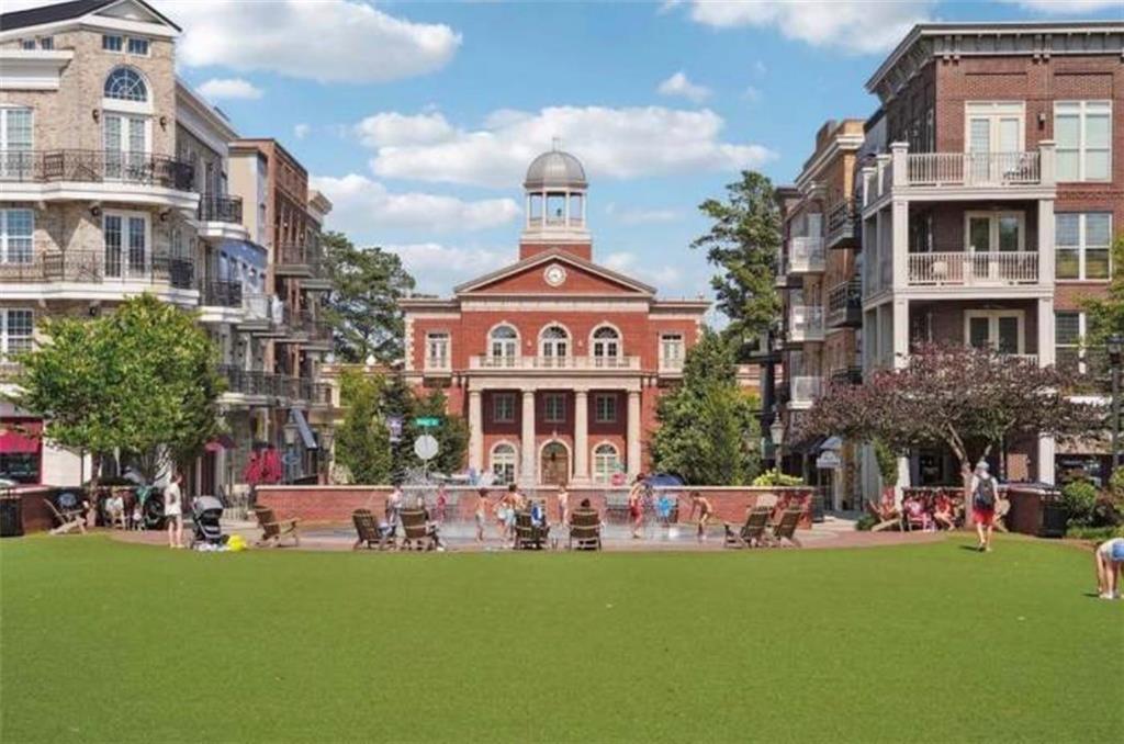465 Anglin Walk Alpharetta, GA 30009 - Photo 40 of 40 a front view of a building with play ground and swimming pool