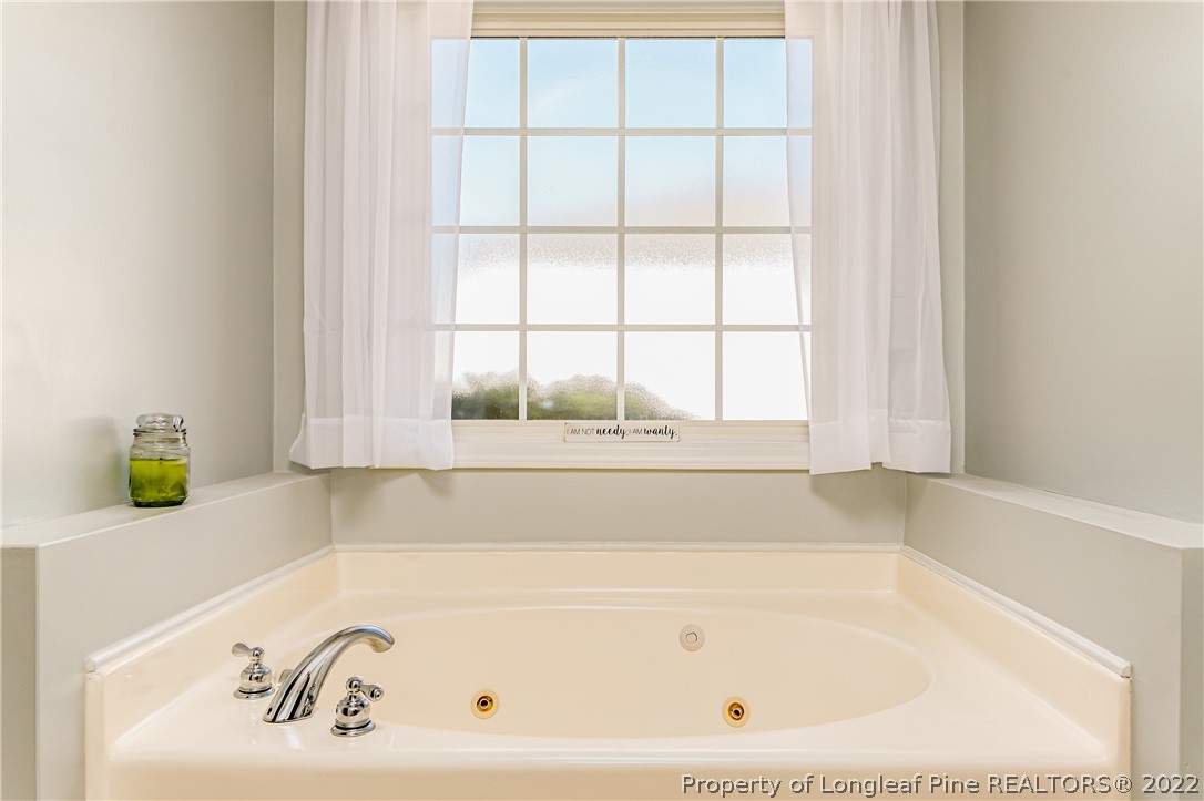 23 Beryl Circle Pinehurst, NC 28374 - Photo 17 of 29 a bathroom with a bathtub