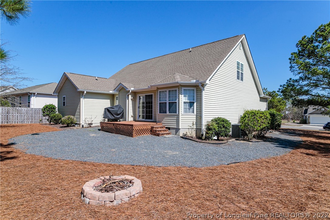 23 Beryl Circle Pinehurst, NC 28374 - Photo 26 of 29 a house view with a backyard space