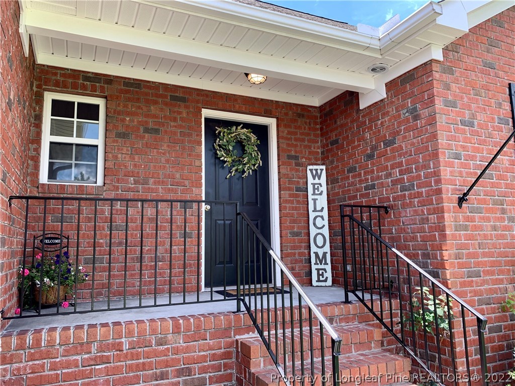 23 Beryl Circle Pinehurst, NC 28374 - Photo 4 of 29 a view of a balcony with a potted plant