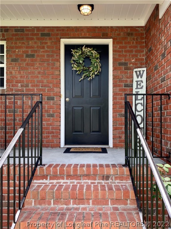 23 Beryl Circle Pinehurst, NC 28374 - Photo 5 of 29 a view of a entryway door
