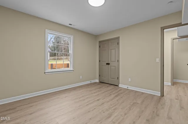 an empty room with windows