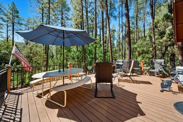 a view of a chairs and table on the wooden floor