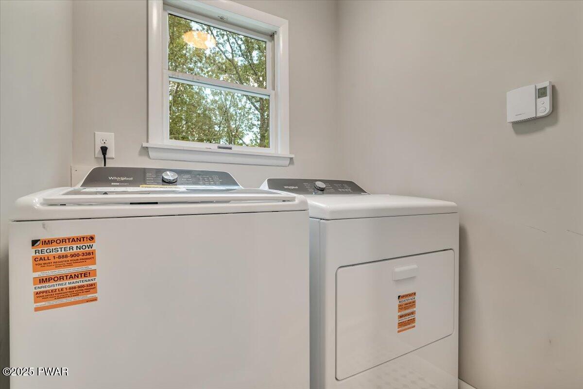 107 Kiel Road Milford, PA 18337 - Photo 41 of 71 a utility room with dryer and washer