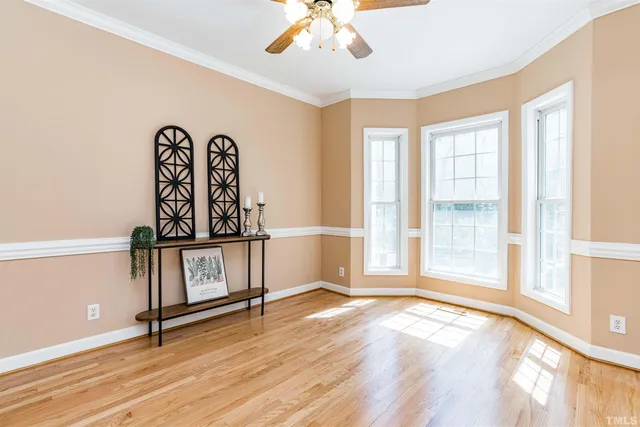 a view of an entryway with wooden floor