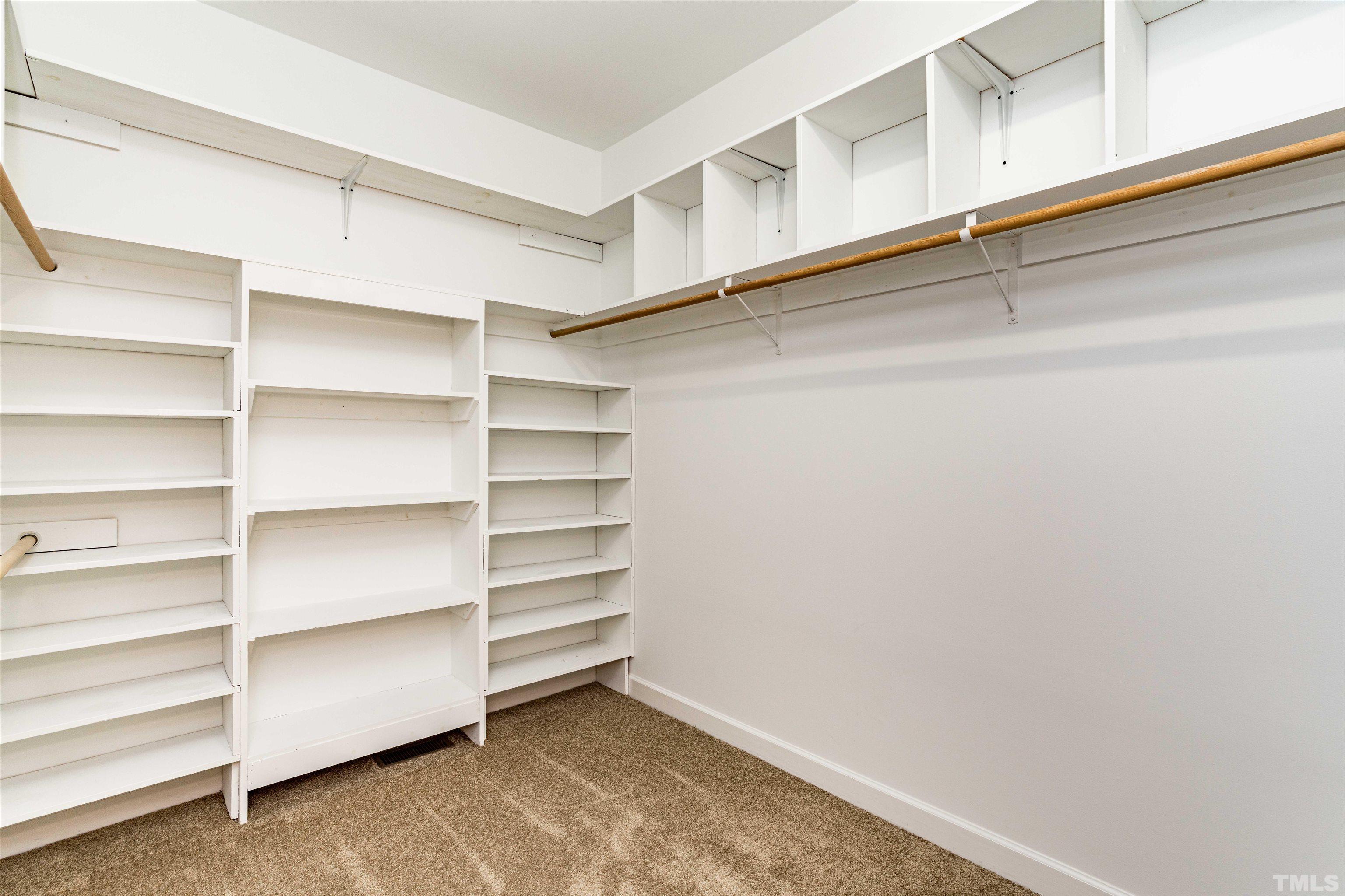 114 Marin Drive Chapel Hill, NC 27516 - Photo 23 of 27 a view of walk in closet with empty racks
