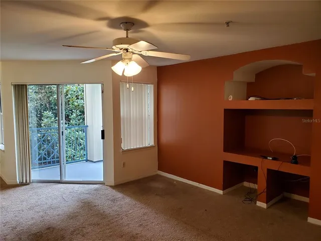 en empty room with windows