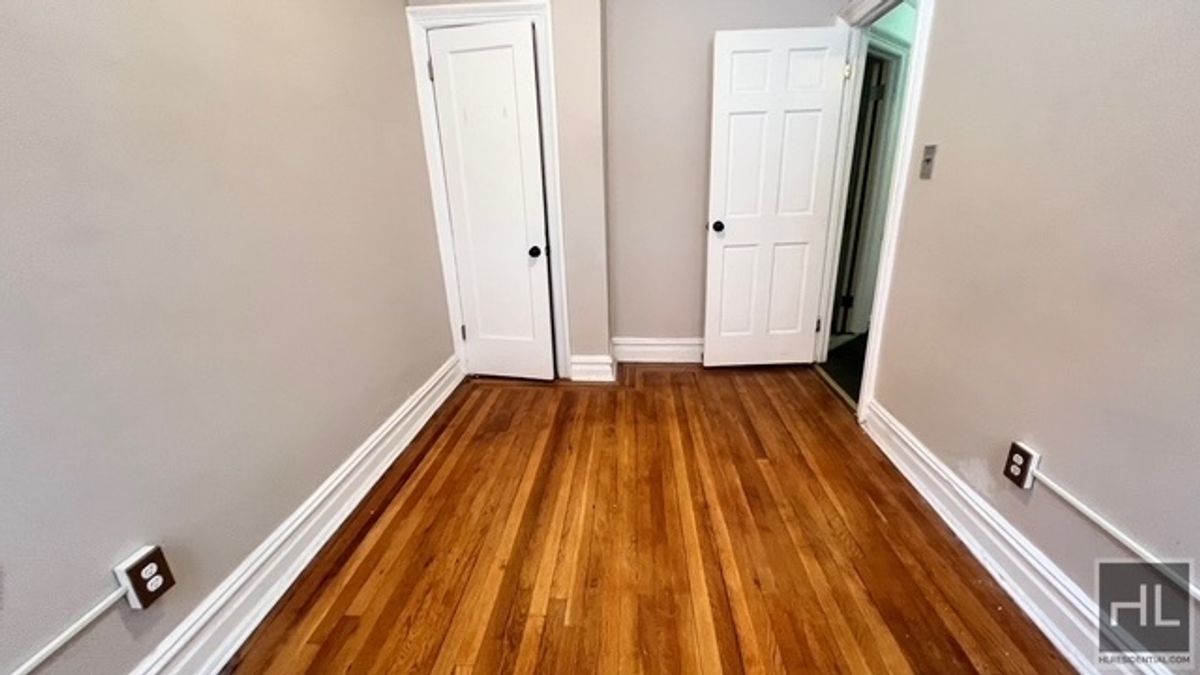 797 Lenox Road, Unit 1 Brooklyn, NY 11203 - Photo 10 of 21 a view of a room with wooden floor